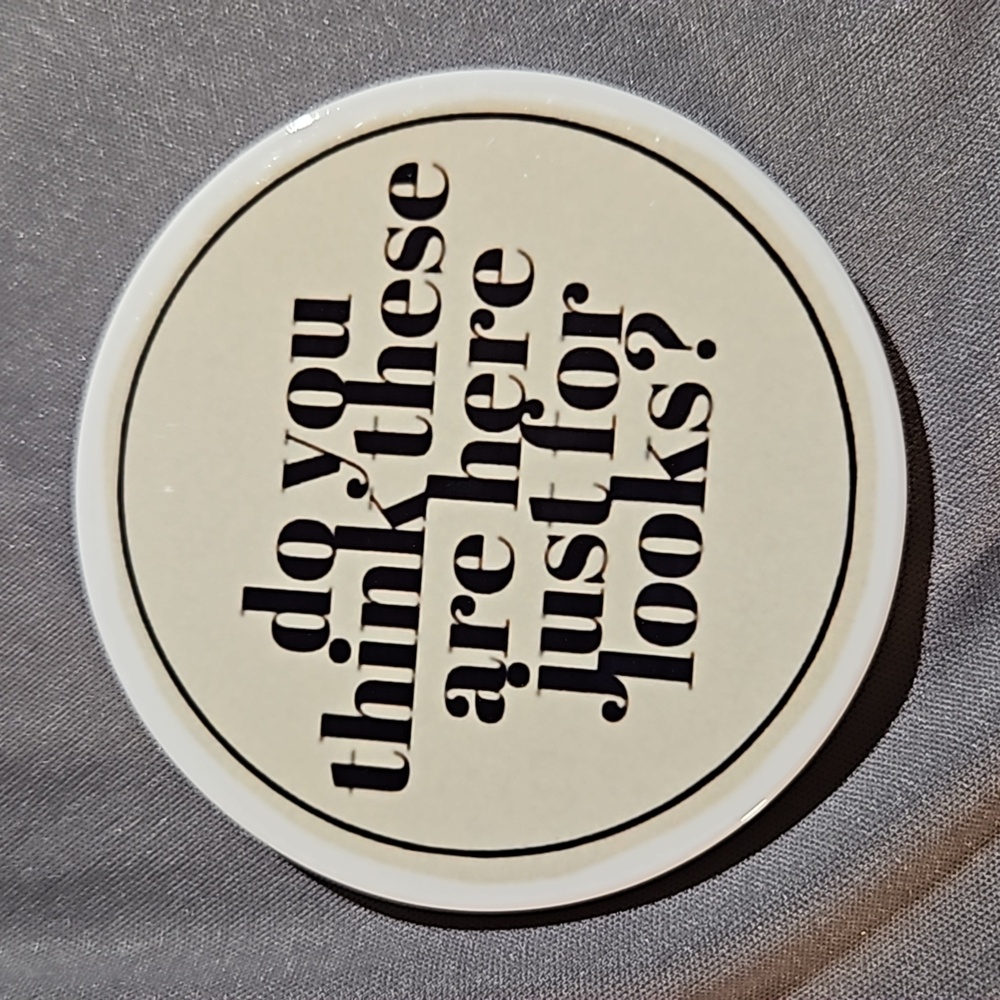 22. Set of 4 Ceramic Coasters